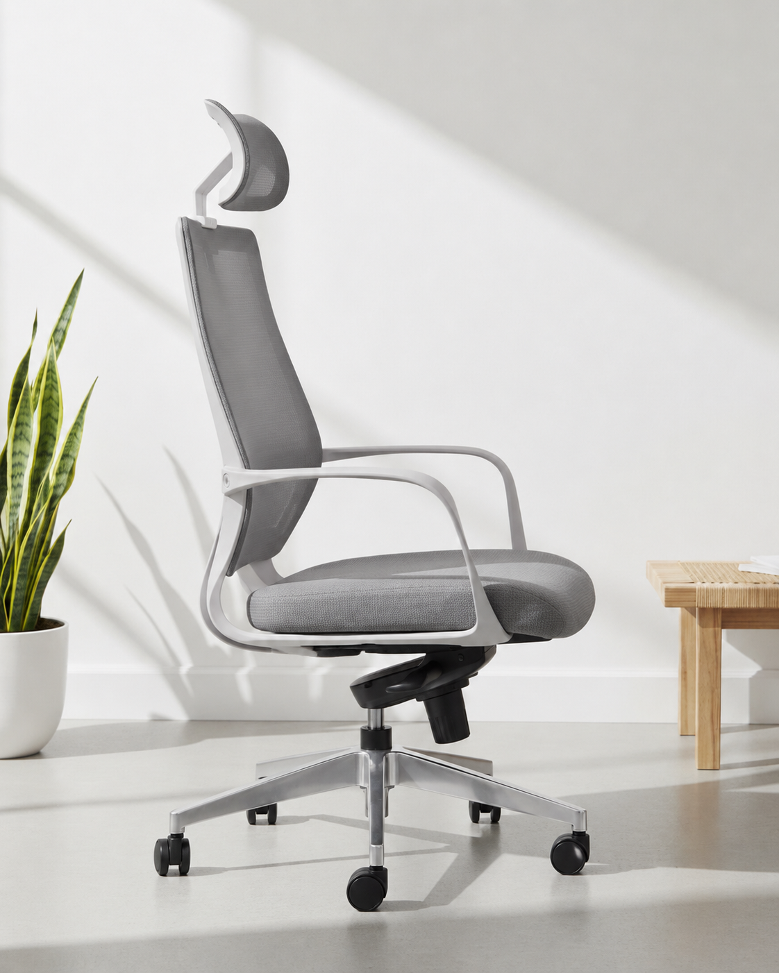 Side view of Zak HB high-back ergonomic mesh office chair showing headrest height, mesh back and aluminium five-star base – Kazuri Store