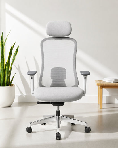 Front view of white high-back executive mesh revolving office chair with integrated headrest, adjustable armrests and gas lift base – Ace HB by Kazuri