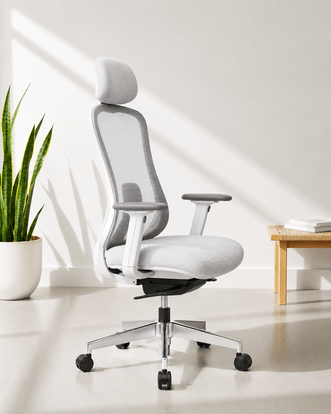 Side view  of white  high-back executive mesh revolving office chair with integrated headrest, adjustable armrests and gas lift base – Ace high back by Kazuri