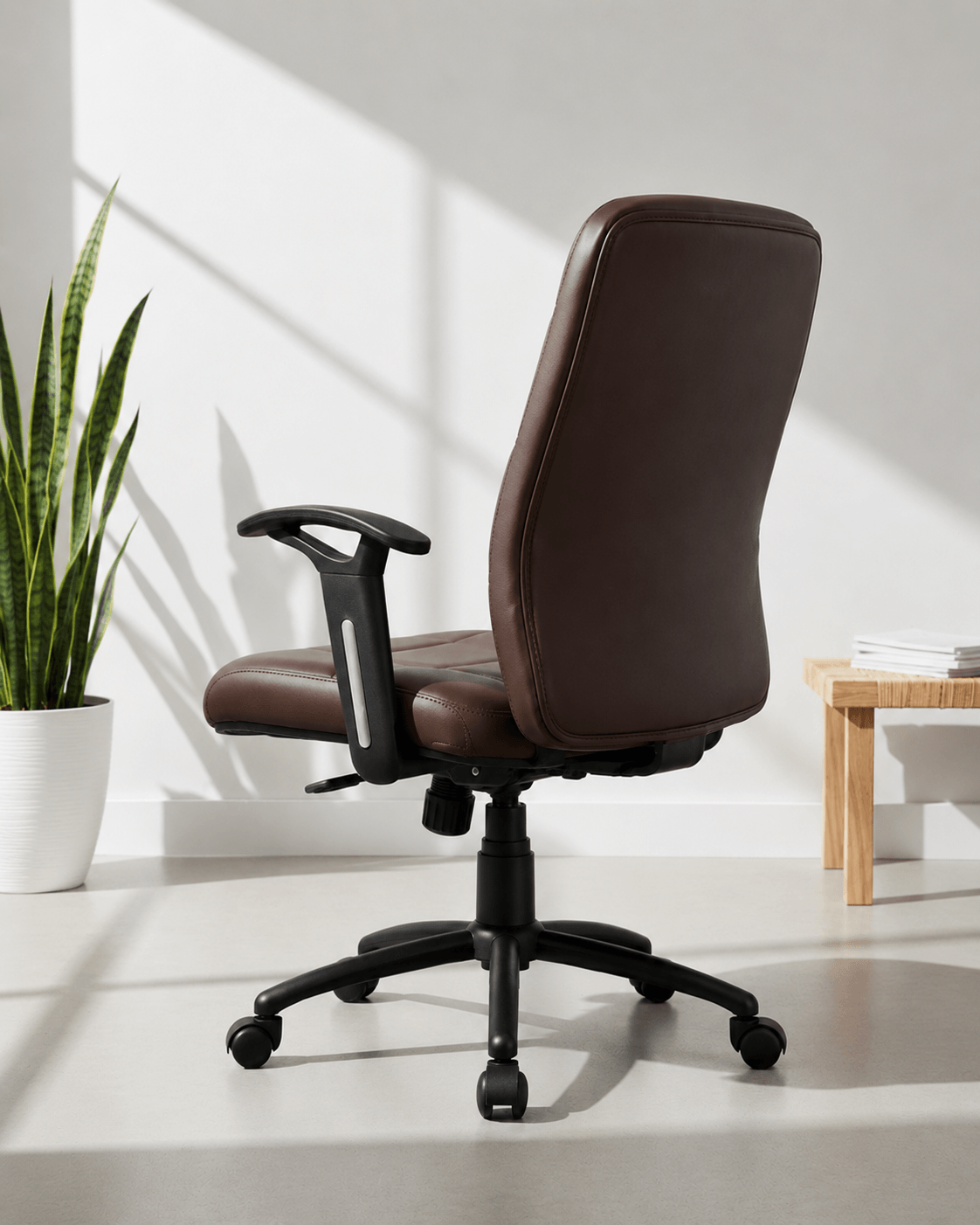 Rear view of Checks MB mid-back executive leatherette office chair showing distinctive quilted grid-stitch pattern and MS black PC five-star swivel base – Kazuri Store