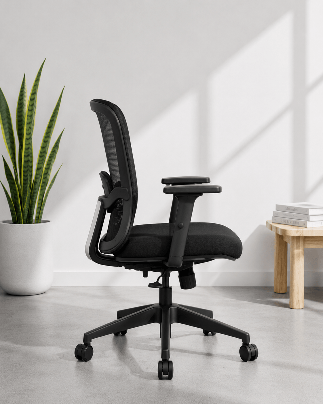 Side view of Dune mid back ergonomic mesh office chair showing lumbar support, mesh back and adjustable armrests – Kazuri Store