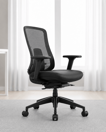 Side view of black mid-back ergonomic revolving office chair with moulded foam seat, adjustable armrests and hydraulic gas lift base – Fedo MB by Kazuri