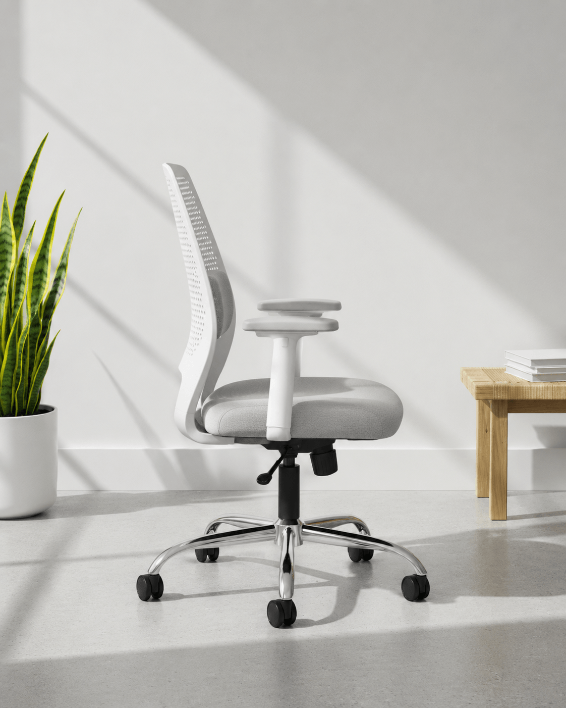 Side view of Hive MB mid-back ergonomic office chair showing foam seat depth and gas lift column – Kazuri Store