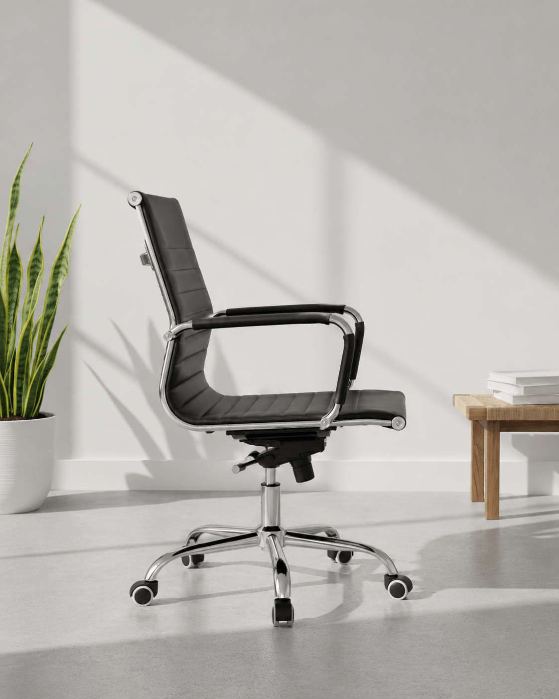 Side view of Sleek MB mid-back executive office chair showing cushioned seat depth, fixed armrests and chrome gas lift base – Kazuri Store
