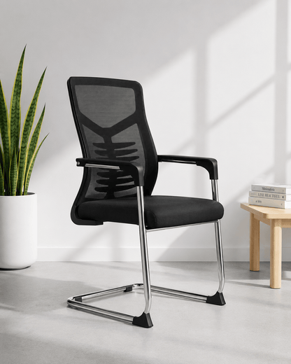 Front view of black fixed visitor chair with moulded foam seat, fixed armrests and chrome base – SM 723 by Kazuri
