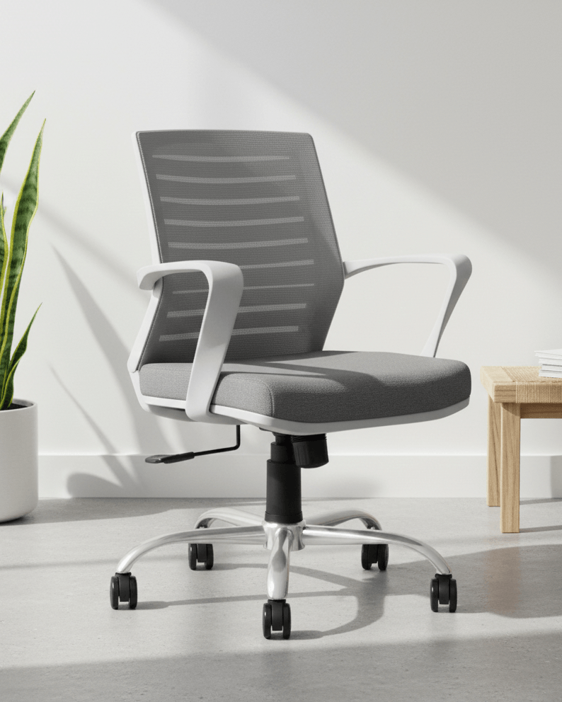 Front view of grey mid-back mesh revolving office chair with cushioned seat, fixed armrests and nylon swivel base with castors – Tom MB by Kazuri
