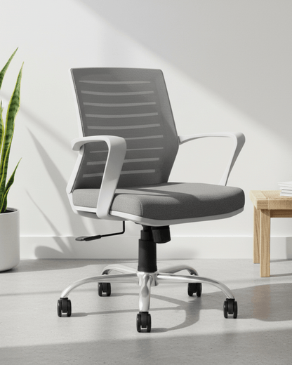 Front view of grey mid-back mesh revolving office chair with cushioned seat, fixed armrests and nylon swivel base with castors – Tom MB by Kazuri
