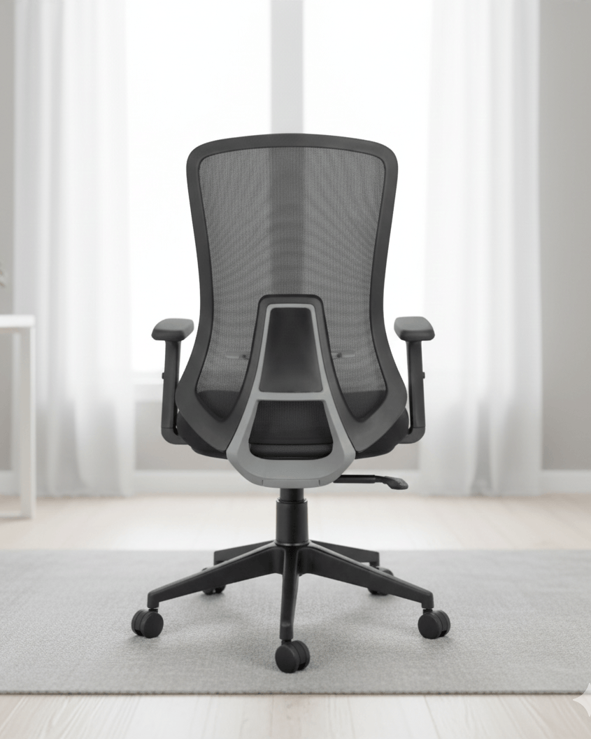 Back view of black mid-back ergonomic revolving office chair with moulded foam seat, adjustable armrests and hydraulic gas lift base – Fedo MB by Kazuri