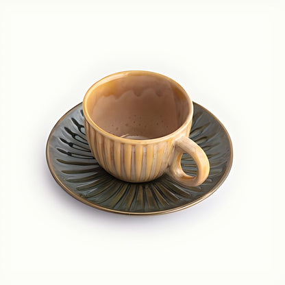 Magnolia Stoneware Teacup and Saucer by Kazuri, photo 2 of 4
