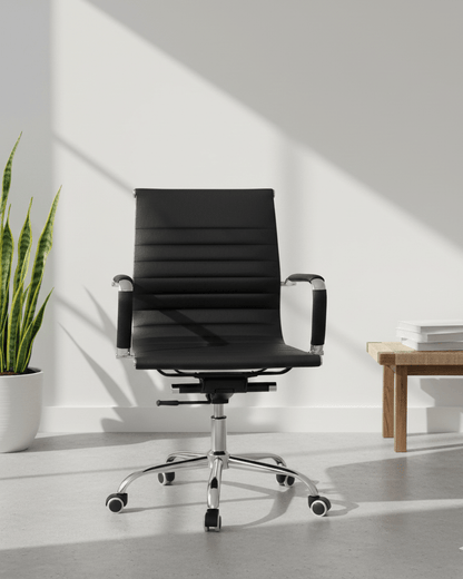 Front view of black mid-back executive cushioned revolving office chair with fixed armrests and premium chrome five-star base – Sleek MB by Kazuri
