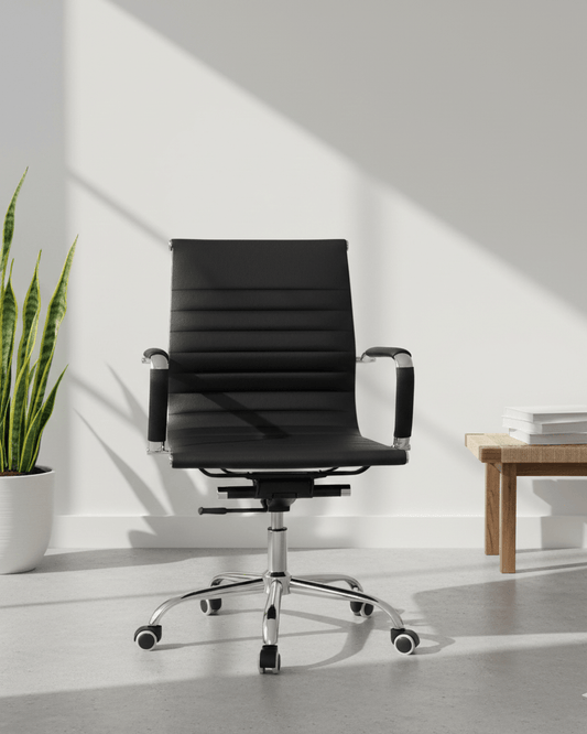 Front view of black mid-back executive cushioned revolving office chair with fixed armrests and premium chrome five-star base – Sleek MB by Kazuri