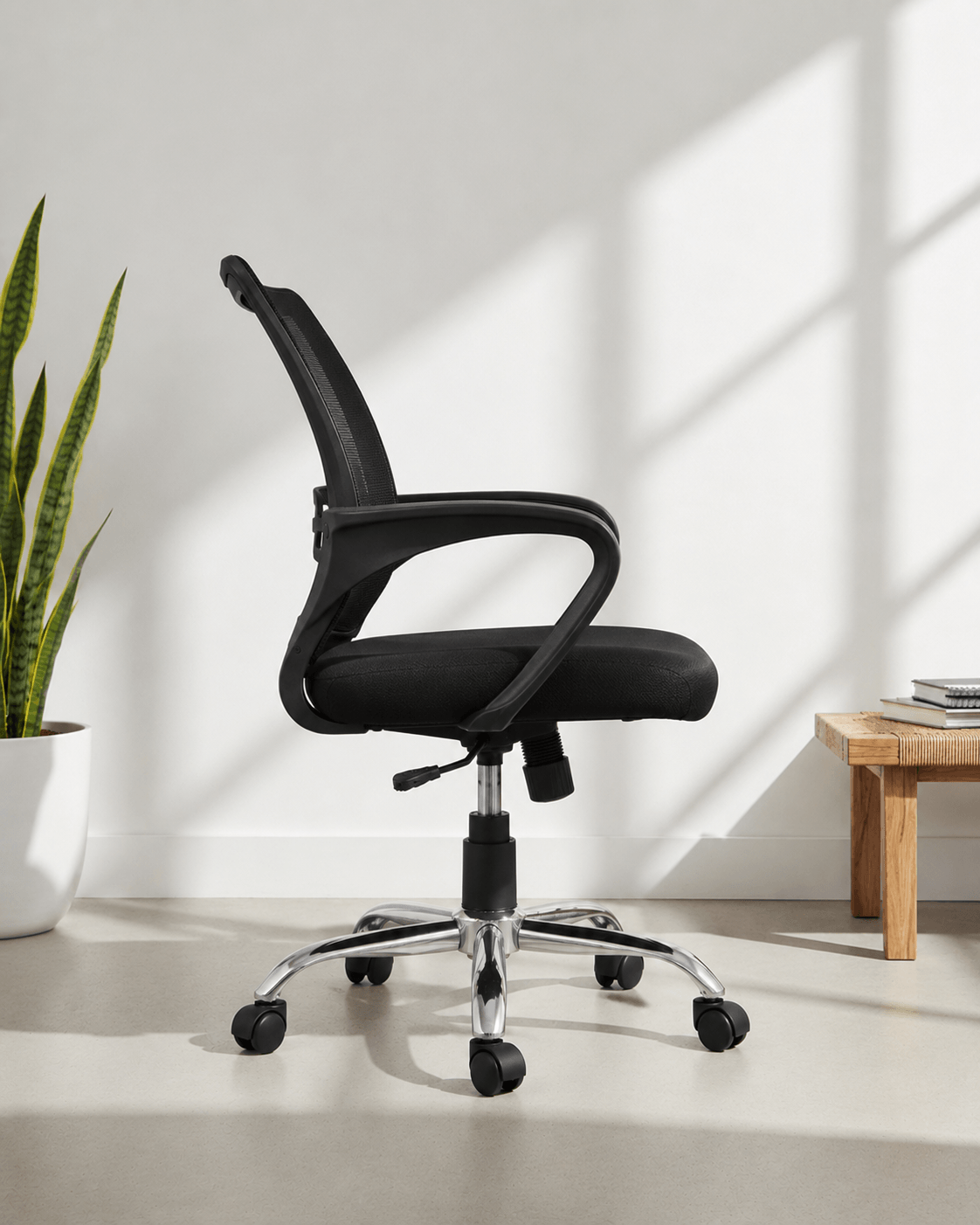 Side view of Zig Zag MB mid-back ergonomic office revolving chair showing cushioned seat and gas lift base – Kazuri Store